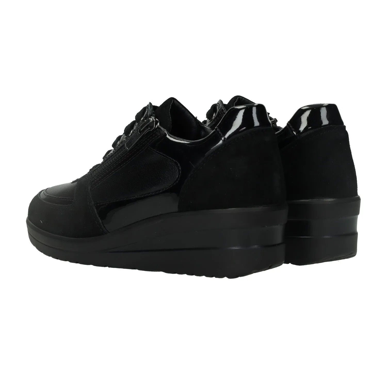 Sneakers con mini zeppa. Tacco alto 4 cm. Tata soft
